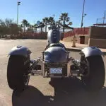 A motorcycle parked in the middle of a parking lot.