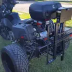 A motorcycle with a large tire on the back of it.