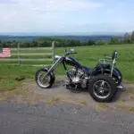 A motorcycle parked on the side of a road.