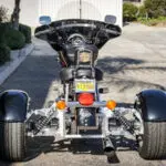 A motorcycle parked on the side of a road.