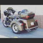 A motorcycle with a side car parked on the street.