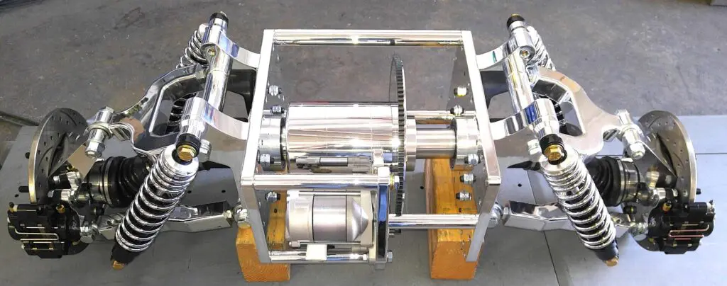 A metal frame with wheels and a motor on it.
